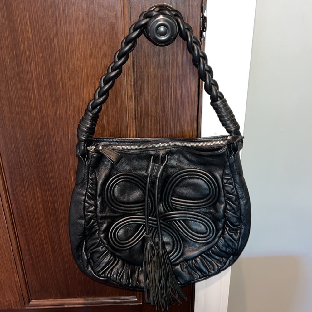 Black leather Frosting Mary Norton swirly oversized purse handbag tassels boho